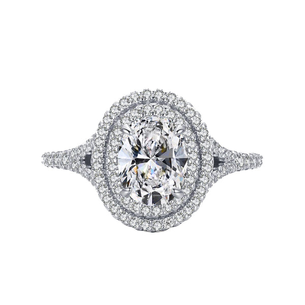 oval double halo ring with split shank and side stones cathedral setting