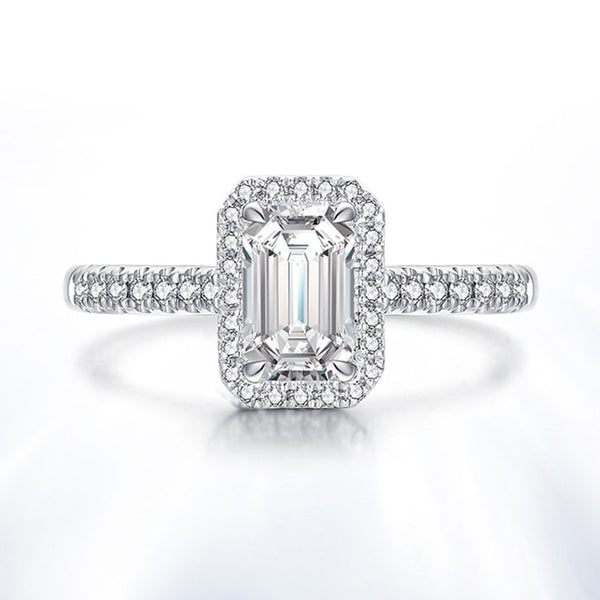 Emerald cut with halo and pave styled side stones ring 