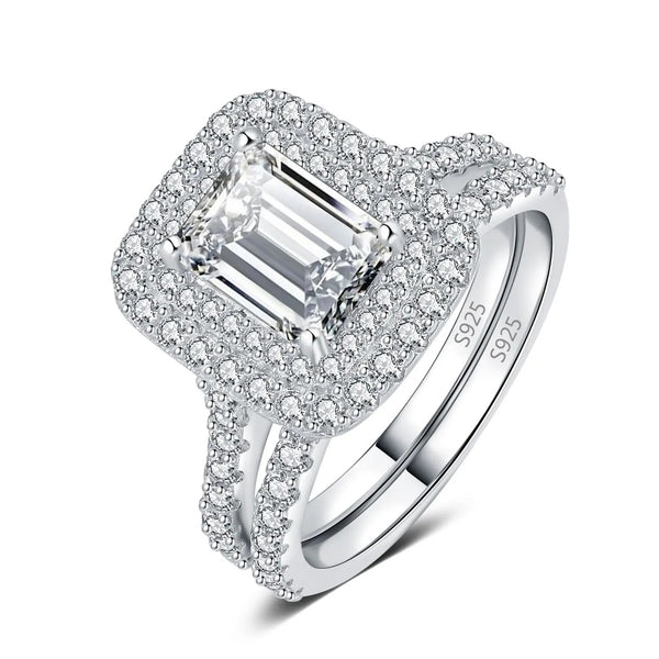 6.5mm by 8mm - 2.17 Carat Emerald Cut Double Halo Petite Style Wedding Set, Featuring Side Stones on both of the Engagement and Wedding Bands, Set in Sterling Silver WS042
