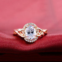 Pear Cut Halo Style Engagement Ring Adorned with Intricate Heat Shaped Detailing, Rose Gold Color Plated Eng072