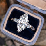 Beautiful marquise cut with baguettes tapered on side of center stone