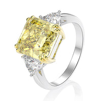 4 Carat Yellow Classic 3 Stone Cushion Engagement Ring with Trillion Side Stones Featuring Gold Split Prongs Set in Sterling Silver Available with White, Yellow Or Pink Gem Color Eng085