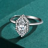 engagement ring with halo marquise cut 