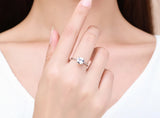 solitaire cushion cut engagement ring with twisted rope band 