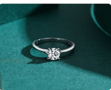 Solitaire engagement ring round prongs shaped hearts 