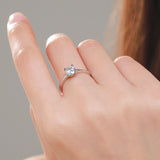 Solitaire engagement ring round with prongs like hearts 