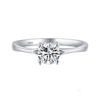 Round solitaire ring heart shaped prongs 