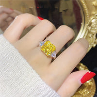 4 Carat 9mm Cushion Three stone Engagement Ring with Triangle Side Stones.  Available in Yellow, Pink or Colorless Center Stones Eng005