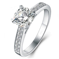 1.5 Carat Round Engagement with Channel Set Side Stones Set in Sterling Silver Eng024