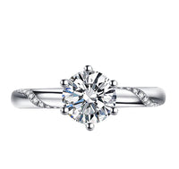 Round engagement ring pave side stones 